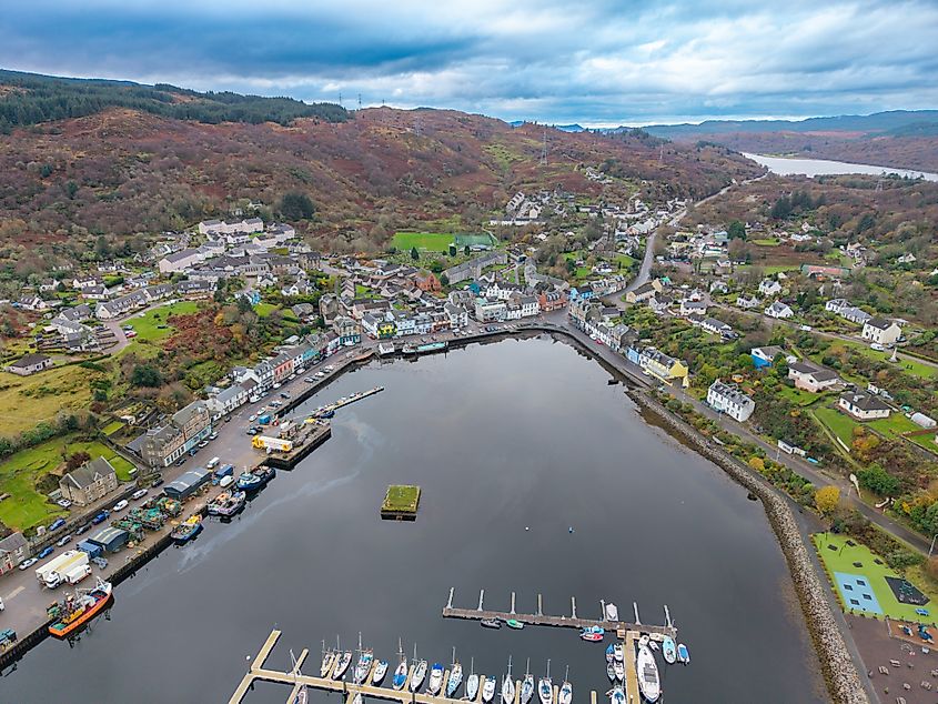 An aerial view of the picturesque Tarbert Harbour in the village of Tarbert, Loch Fyne, Argyll, Scotland