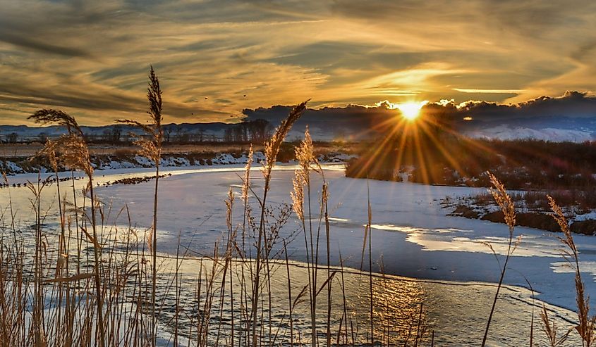 Sun over Little Wind River, Riverton, Wyoming.