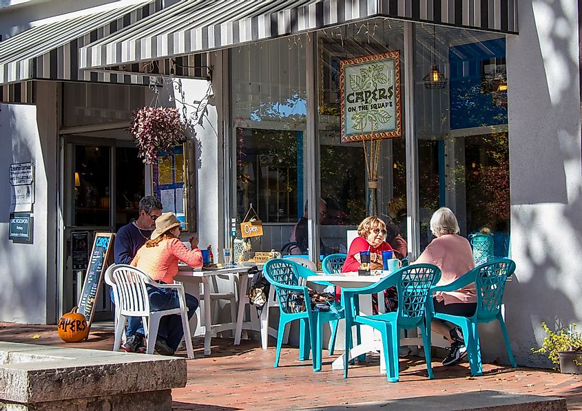 Dining alfresco on a warm autumn afternoon on the sidewalk in front of Capers, one of the several eateries on the historic public square, via Jen Wolf / Shutterstock.com