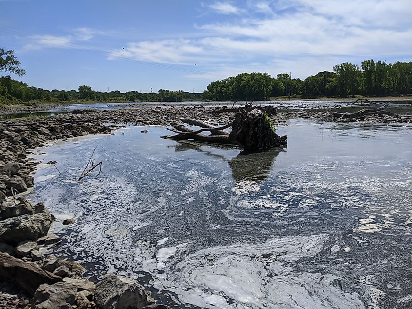 Low water levels are often caused by dry, hot weather and lack of precipitation. Mississippi River near Coon Rapids, Minnesota during summer. Credit: KARI K/Shutterstock.com
