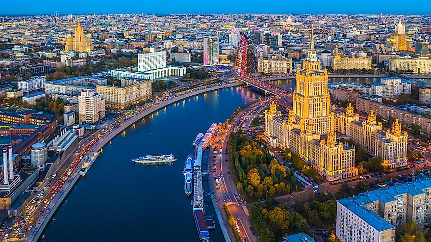 Moscow City with Moscow River at night, Moscow skyline with the historical architecture skyscraper, Aerial view tourist boat and bridge with Arbat street,