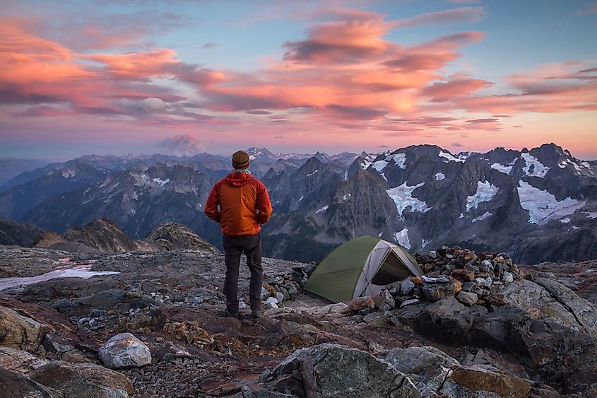 A hiker at sunset in North Cascades National Park