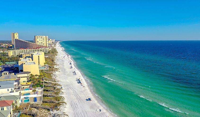 Aerial beach views from Miramar, Beach Florida. Shoreline and hotels line the beach. 