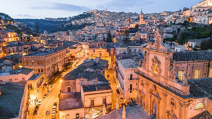 The illuminated Church of San Bartolomeo in the baroque town of Scicli, Sicily (RossHelen / Shutterstock)
