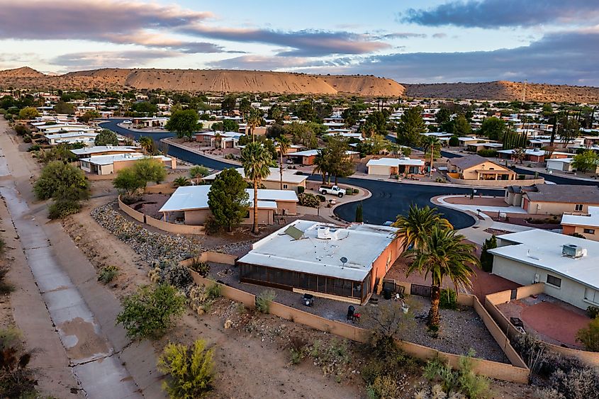 Sahuarita Lake in Arizona near Tucson, bordered by suburban homes and residential neighborhoods