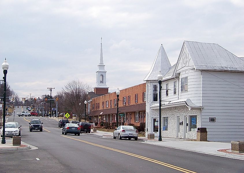 Looking down the Main Street in Christiansburg with cars on the street