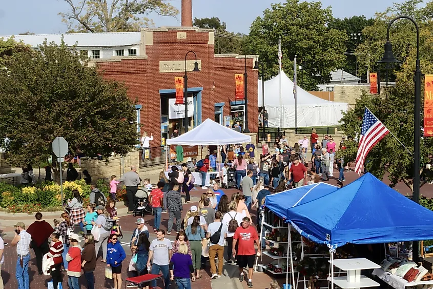 People enjoying the Maple Leaf Festival, Baldwin City, Nevada, via 