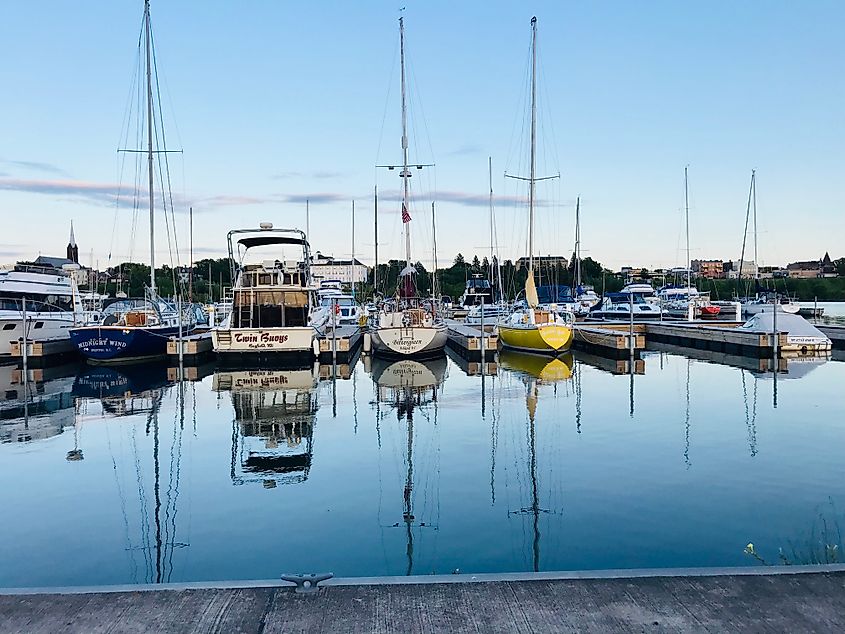 Boats sitting in the Ashland harbor in Ashland, Wisconsin. Image credit Neil Liesenfeld via Shutterstock