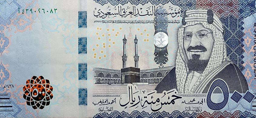 Large fragment of the obverse side of 500 five hundred Saudi riyals banknote features Kaaba in Mecca and portrait of king AbdelAziz Al Saud series 1438 AH, Selective focus of Saudi Arabia currency