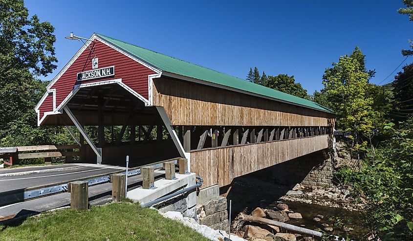 Red covered Bridge in Jackson, New Hampshire overtop of the river