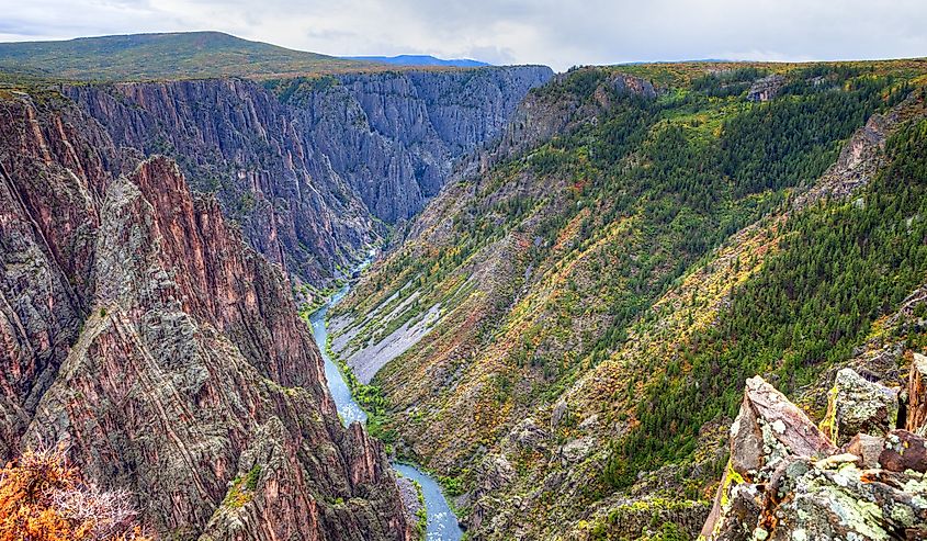 a river gorge with mountains on either side