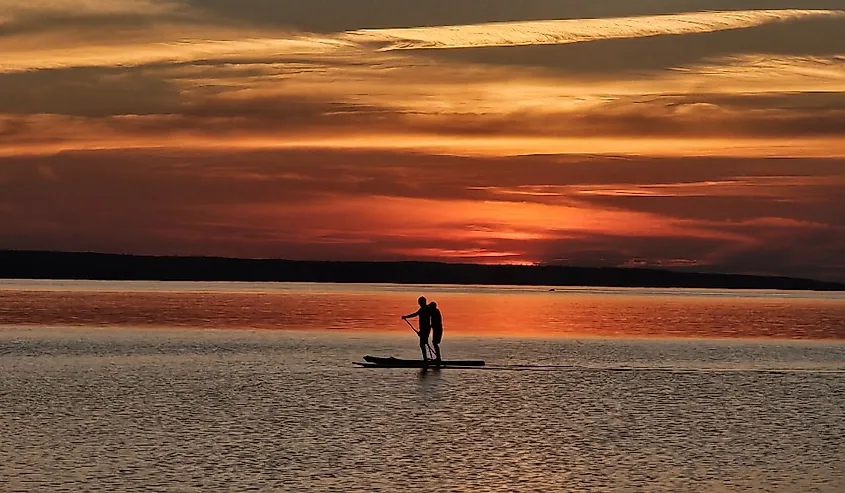 Paddle boarders on Waskesiu Lake, Saskatchewan.