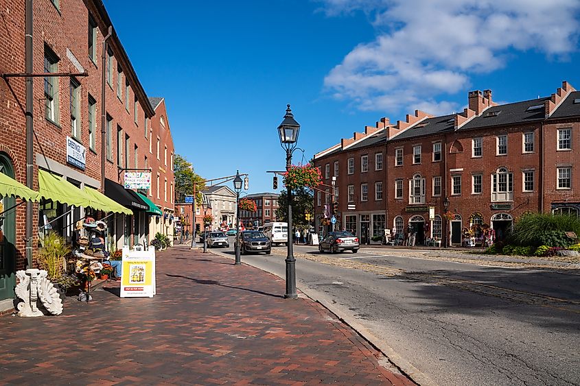 Newburyport, Massachusetts - October 7, 2021: Street scene in the historic seaport city of Newburyport in Massachusetts seen from tourist area of Market Square. Little Vignettes Photo via Shutterstock