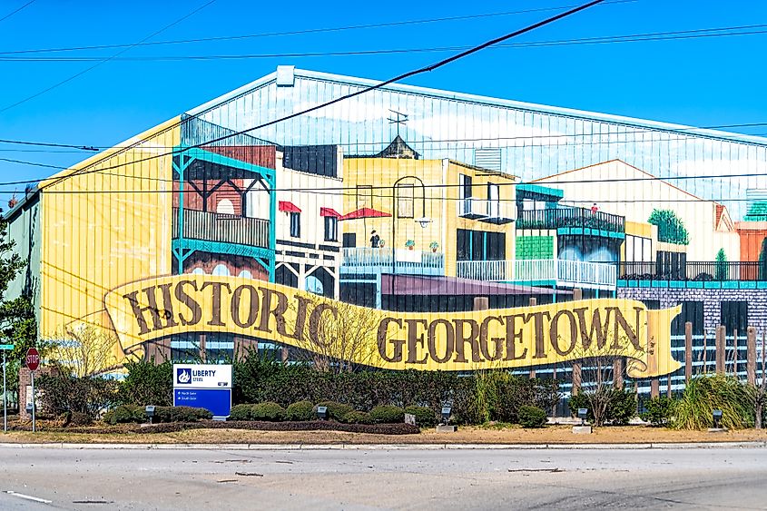 Building with colorful mural sign facade for historic city town and Liberty Steel in South Carolina. 