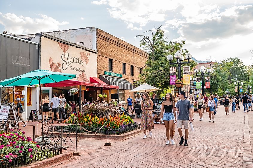 Visitors enjoying the charming downtown ambiance of Boulder, Colorado.