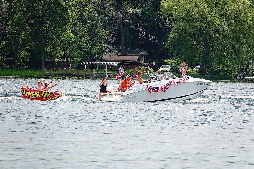 Green Lake, Wisconsin / USA - July 4th, 2020: Members of green lake community held a 4th of july boat parade on the lake to celebrate american independence day holiday.