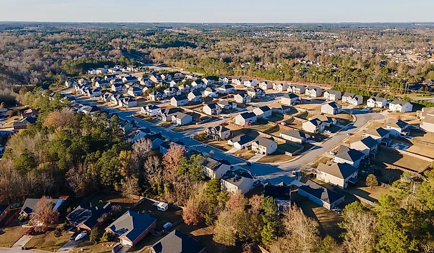  Aerial landscape of Euchee Creek Trails suburban neighborhood during Fall in Grovetown Augusta Georgia.