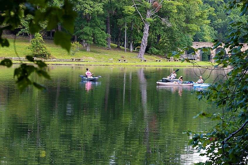 People boating in Bryd Lake at Cumberland Mountain State Park in Crossville, Tennessee