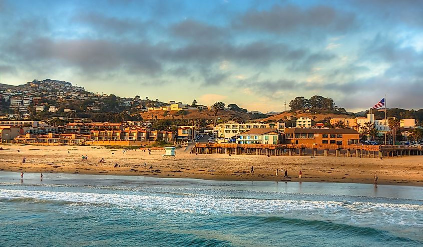 sun setting on Pismo beach pier