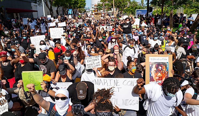 Crowds of white and black people at a demonstration for human rights