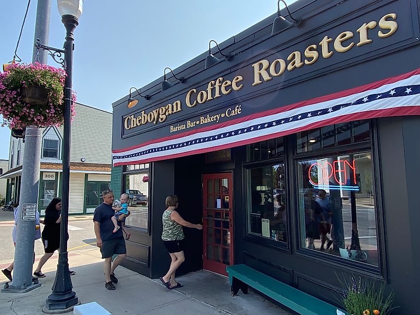 A line of customers on the sidewalk outside of Cheboygan Coffee Roasters.