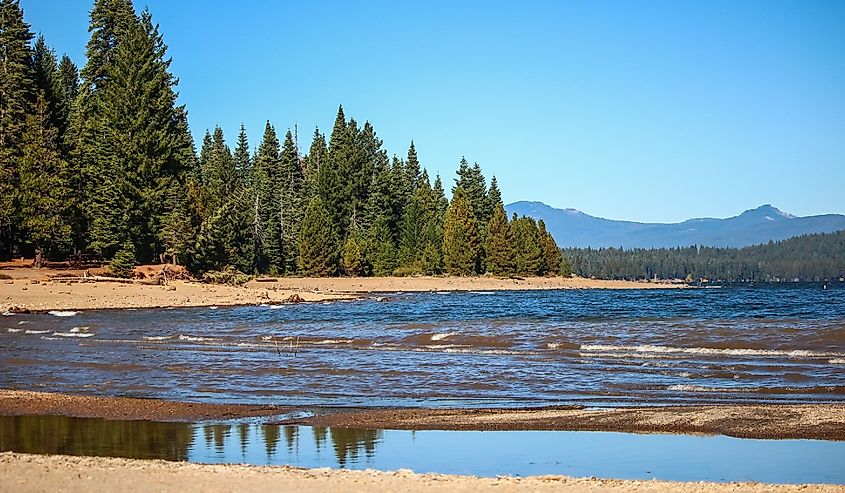 Sandy beaches at Lake Almanor scenic view from Rocky Point Campground, California