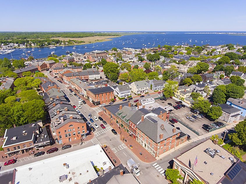 Aerial view of Newburyport historic downtown including State Street and Market Square with Merrimack River at the background. 