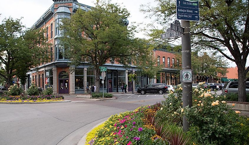 Downtown street view in Ft. Collins, Colorado, USA with flowers in bloom.