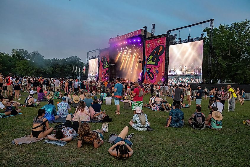 The War on Drugs performs for colorful crowd at Bonnaroo music festival in Manchester, Tennessee, via L Paul Mann / Shutterstock.com