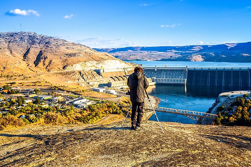 Photographer taking photographs of the Grand Coulee Dam