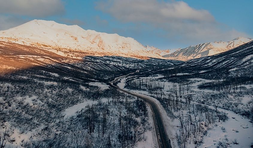 Aerial view of Hatcher Pass Road in winter.