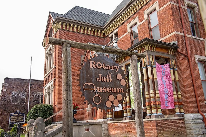 Sign in front of the exterior of the Rotary Jail Museum in Crawfordsville, Indiana.