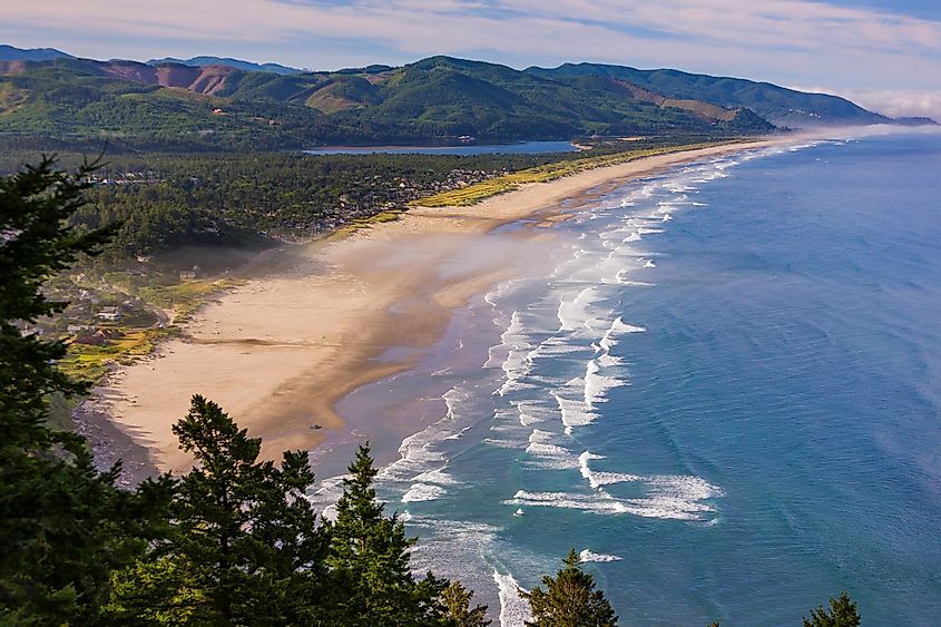 Aerial of Manzanita Beach and Pacific Ocean surf on Oregon coast, via Rob Crandall / Shutterstock.com