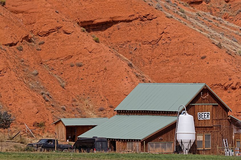 A countryside brewery under an orange cliff, Ten Sleep, Wyoming.