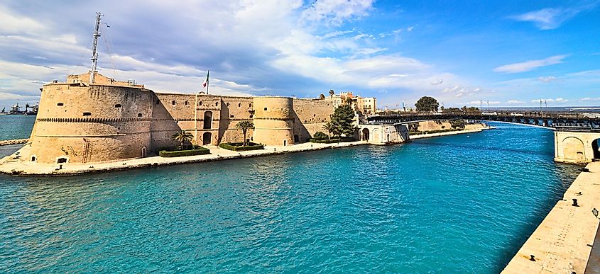 Taranto old Aragonese Castle on sea channel and revolving bridge