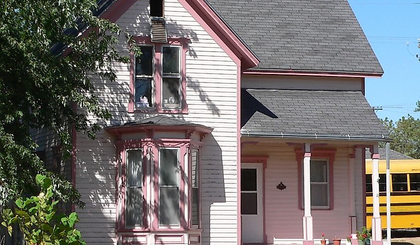 Dr. Gilbert McKeeby House, located at southwest corner of Cherry Street and 7th Avenue in Red Cloud, Nebraska; seen from the east. The Greek Revival house is listed in the National Register of Historic Places.