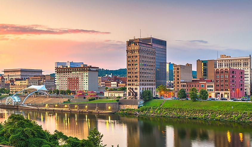 Charleston, West Virginia, downtown skyline on the river at dusk.