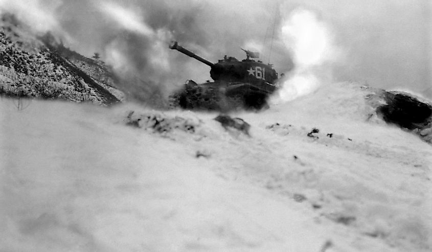 M46 tank of 6th Tank Battalion fires on enemy positions in support of the infantry near Song Sil-li, Korea.