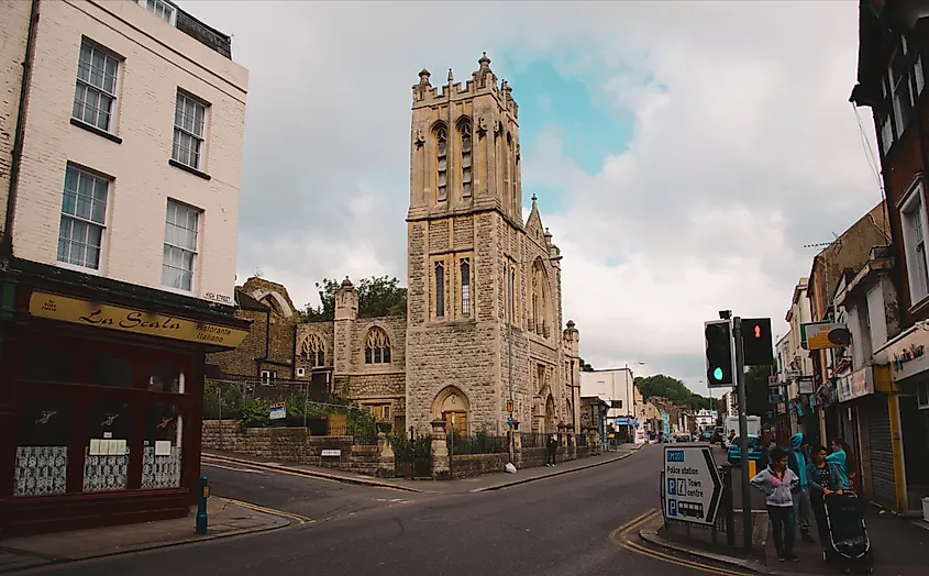 High Street and Priory Hill in downtown Dover, England, with the former Saint Martin’s Church on the corner