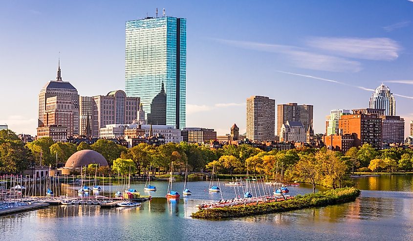 Boats in the harbor overlooking the Boston, Massachusetts, USA city skyline