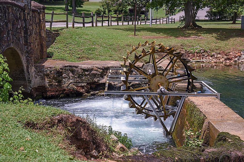 An old waterwheel in a park in Tuscumbia, Alabama