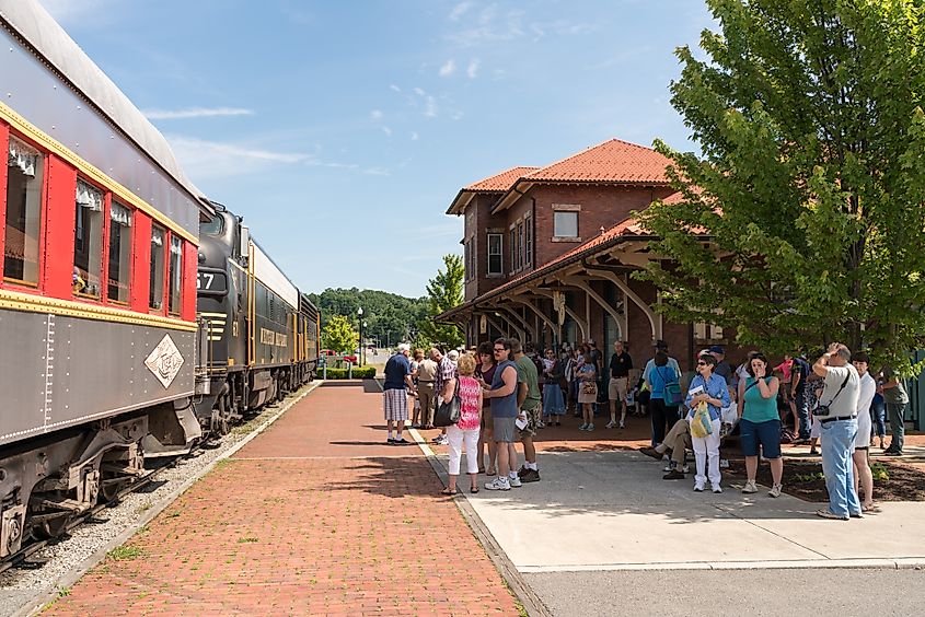 Tourists ready to board Tygart Flyer ready for trip into mountains of West Virginia by Durbin and Greenbrier Vallery Railroad. Editorial credit: Steve Heap / Shutterstock.com