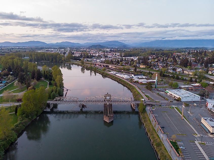 Blue waters of the Skagit River from an eye-level perspective in Mount Vernon, Washington