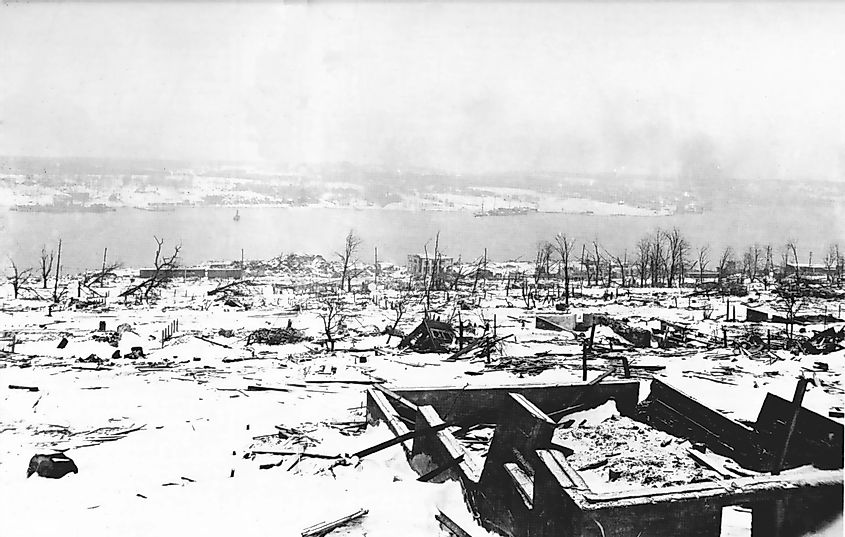 A view across the devastation of Halifax two days after the explosion, looking toward the Dartmouth side of the harbour. Imo is visible aground on the far side of the harbour.