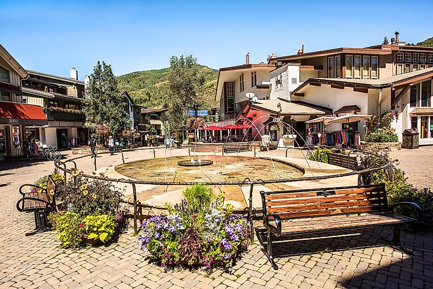 Fountain at a square on Bridge Street in Vail, Colorado with benches, via Andriy Blokhin / Shutterstock.com
