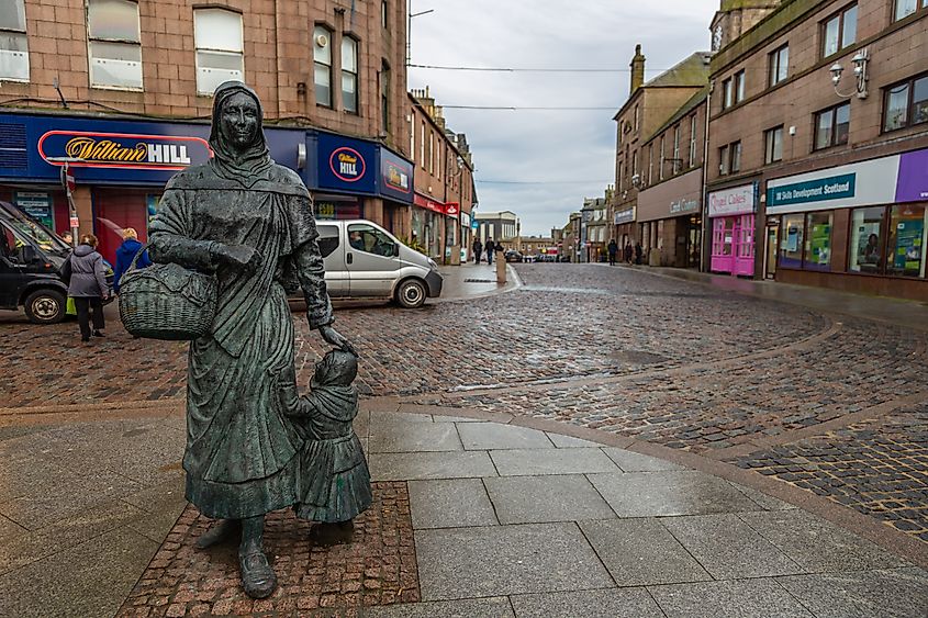 Sculpture of a woman and young girl in the main square of Peterhead, Scotland.