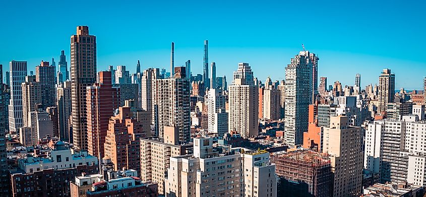Panorama view of skyscrapers and high-rise residential towers on the Upper East Side (Yorkville) in New York City. Credit: Roaming Pictures / Shutterstock