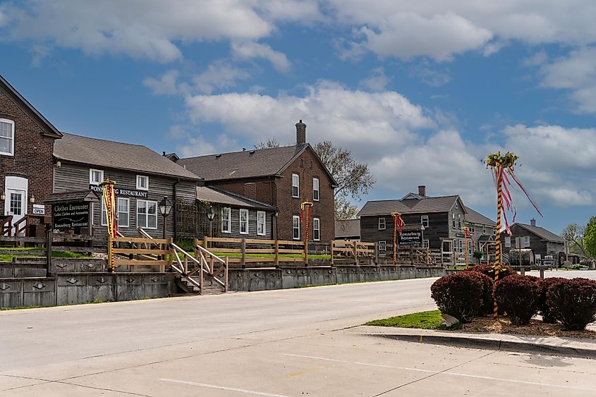 Amana Colonies in Iowa with May poles decorating the Main Street on May Day as per German tradition. 