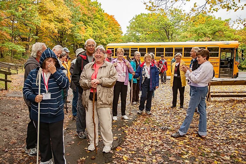 A group of tourists preparing to hike in Watkins Glen State Park in Upper New York