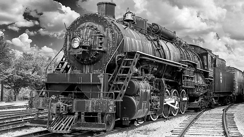 Black and white photo of an old steam engine train